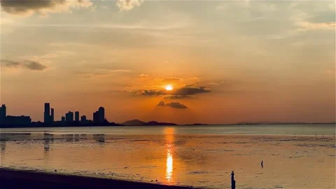 Sky sunset at beach scenery, Whether it's the warm hues of a sunrise or sunset Stock Footage 302633152