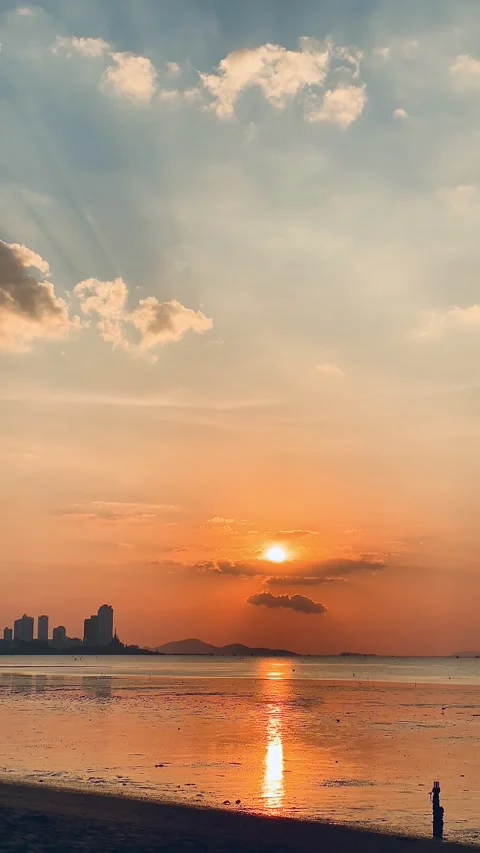 Sky sunset at beach scenery, Whether it's the warm hues of a sunrise or sunset Stock Footage 302633177