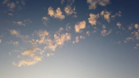 Sky. Sunset. The camera takes a panorama of the sky and descends to the sea. Video stock 119712083