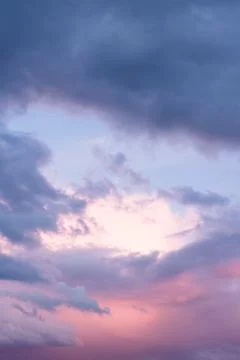 Sky at sunset with moody storm clouds Stock Photos