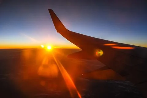 Sky at sunset outside plane window over Botswana, Africa Stock-Fotos
