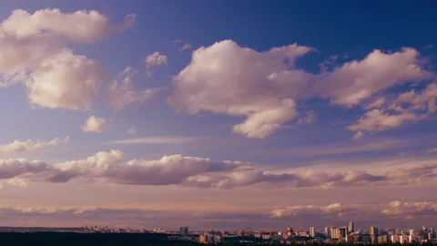 Sky at sunset over a city Stock Footage 133337129