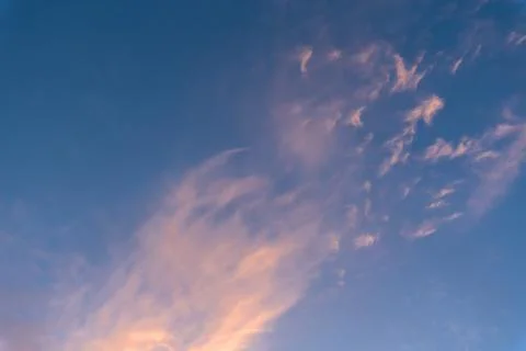 The sky at sunset, pink clouds, background image. Stock Photos
