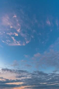 The sky at sunset, pink clouds, background image. Stock Photos