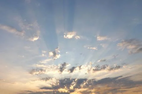 Sky at sunset. Rays and shadows from clouds. Stock Photos