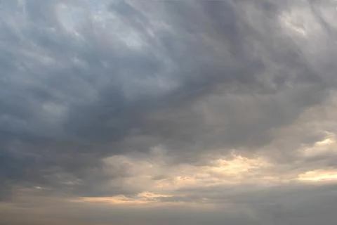 Sky at sunset. Rays and shadows from clouds. Photos