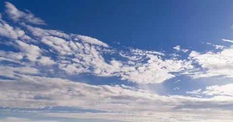 Sky texture with clouds in blue. Soft sky white texture on background. Bright Stock Photos