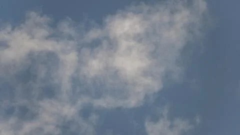 Sky with thin white clouds. Thin whiskey-colored clouds in a blue sky, a vi.. Stock Photos