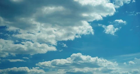 Sky time laps white clouds over a blue sky. Stock Footage 130104954