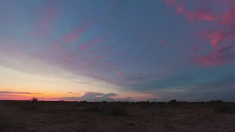 Sky time lapse during sunset time is a stunning display of warm colors, ran.. Stock Footage 280139024