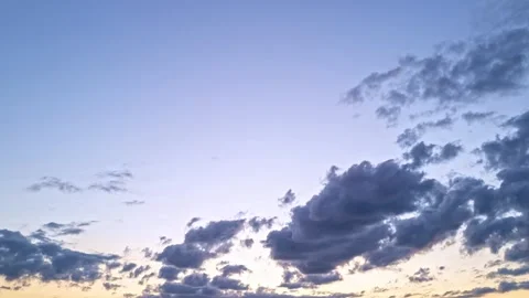 Sky time lapse. Moving clouds at sunset. Clouds float through the evening. Dusk Stock Footage 285016601