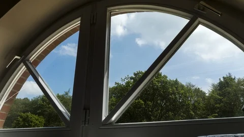 Sky in Time-Lapse Through Semi-Circular Window Stock Footage 121225794