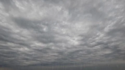 Sky timelapse of massive gray rain dark storm clouds - loop video Stock Footage 247465970