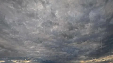Sky timelapse of massive rain dark storm clouds and water drops - loop video Stock Footage 255299624