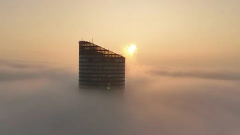 Sky Tower, Wroclaw, Poland during morning foggy sunrise Stock Footage 238089629