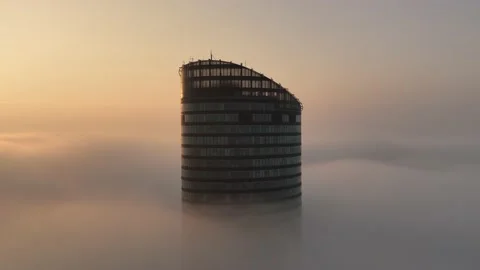 Sky Tower, Wroclaw, Poland during morning foggy sunrise Stock Footage 238089680