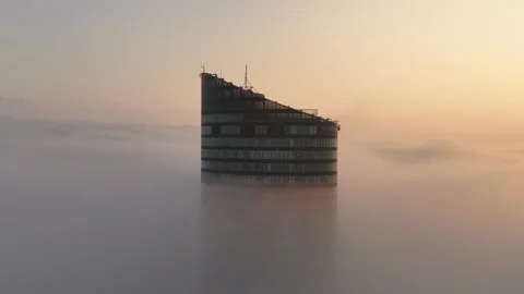 Sky Tower, Wroclaw, Poland during morning foggy sunrise Stock Footage 238089688