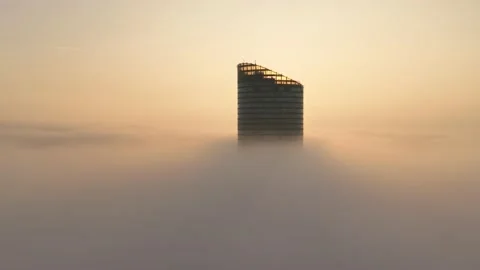 Sky Tower, Wroclaw, Poland during morning foggy sunrise Stock Footage 238089721