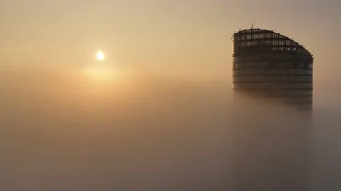 Sky Tower, Wroclaw, Poland during morning foggy sunrise Stock Footage 238089729
