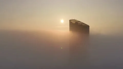 Sky Tower, Wroclaw, Poland during morning foggy sunrise Stock Footage 238089784