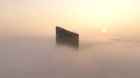 Sky Tower, Wroclaw, Poland during morning foggy sunrise Stock Footage 238089922