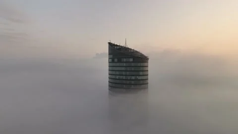 Sky Tower, Wroclaw, Poland during morning foggy sunrise Stock Footage 238089927