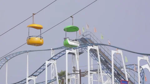 Sky tram and Roller Coaster 1080 24P Stock Footage 243933292