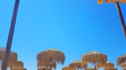 Sky view on a beautiful beach, Skiathos island, Greece, umbrellas and summer Stock Photos