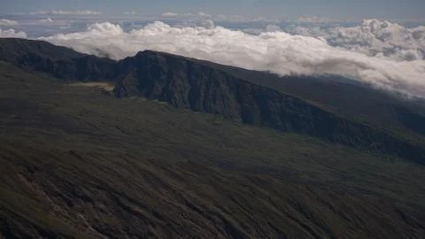 Sky View of Clouds and Mountain Peaks in Maui, Hawaii Stock Photos