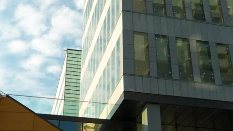 Sky view framed by modern architectural elements and the edge of a Stock Footage 256968712