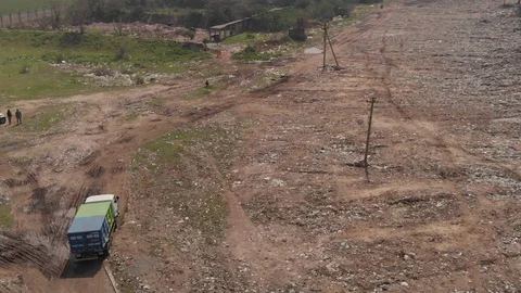 Sky view of garbage disposal trash dump or open landfill, India Stock Footage 128124220