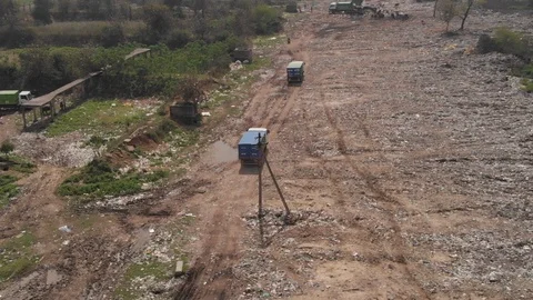 Sky view of garbage disposal trash dump or open landfill, India Stock Footage 128124281