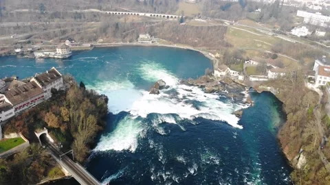 Sky View Of Rhine Falls and Schloss Laufen Railway Bridge in Switzerland Stock Footage 130883181