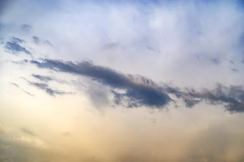 Sky view with scattered clouds during late afternoon transition Stock Photos