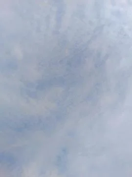 Sky View with Soft Clouds and Light Blue Background, Atmospheric Scene Stock Photos