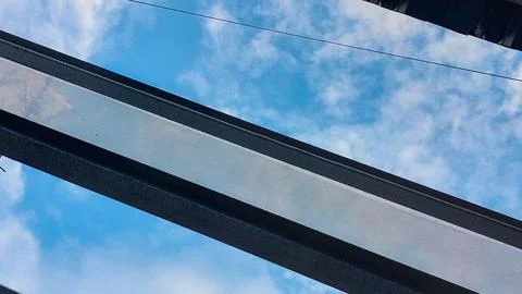 Sky view through a transparent rooftop on sunny day Stock Photos
