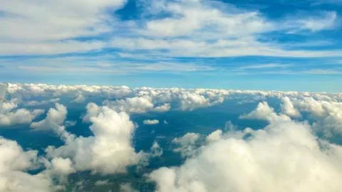 Sky view through window of jet Fotos de archivo