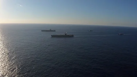 Sky view of US Navy ships sailing Stock Footage 101406581