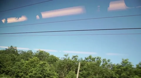 Sky view from a window running train Stock Footage 64973218