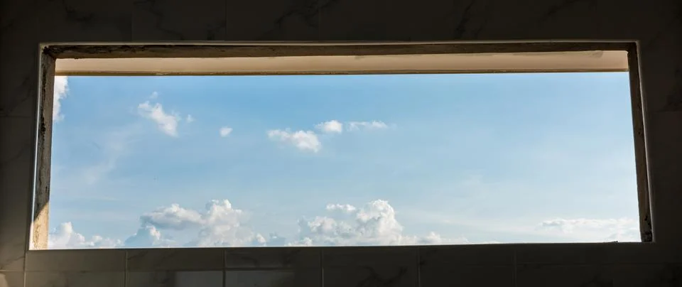 The sky is visible through the window Stock-Fotos