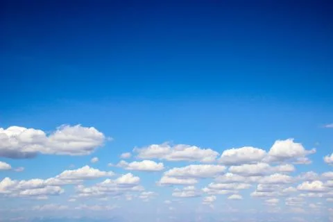 Sky with white clouds pattern background. Stock Photos