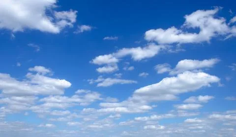 Sky with white cumin clouds. Stock Photos