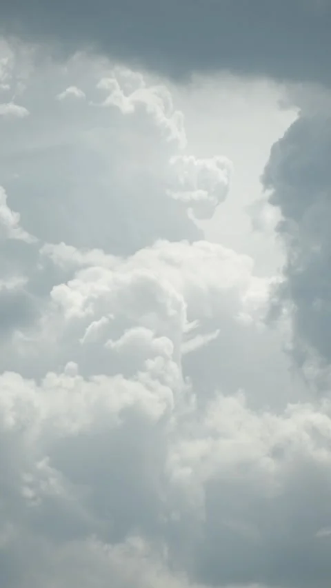 Sky with white fluffy clouds, vertical time lapse video Stock Footage 310947570