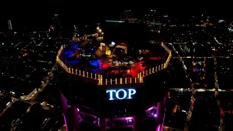 Skybar rooftop of The Top entertainment tower complex at night with a Stock Footage 123356256