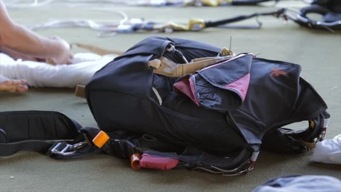 Skydive close up packing parachute skydive equipment. Parachute container close  Video stock 115983350