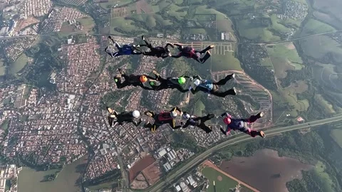 Skydive people make a formation Stock Footage 303016457