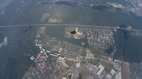 Skydiver in accelerated free fall course Stock Footage 59568873