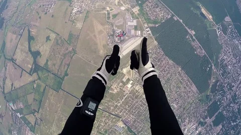 Skydiver in accelerated free fall course pov Stock-Footage 68773196