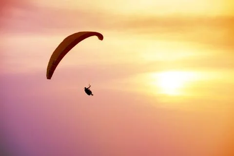Skydiver flies on background of the cloudy sky Stock Photos