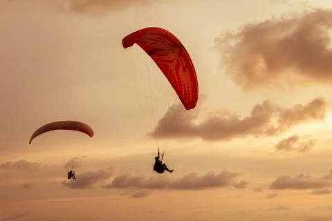 Skydiver flies on background of the cloudy sky Stock Photos